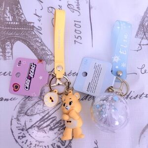 Care Bears Yellow Bear Keychain with Donut Charm and fidget keychains
